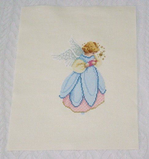 Completed Cross Stitch L L Angel with Baby in Arms Mix Color Version