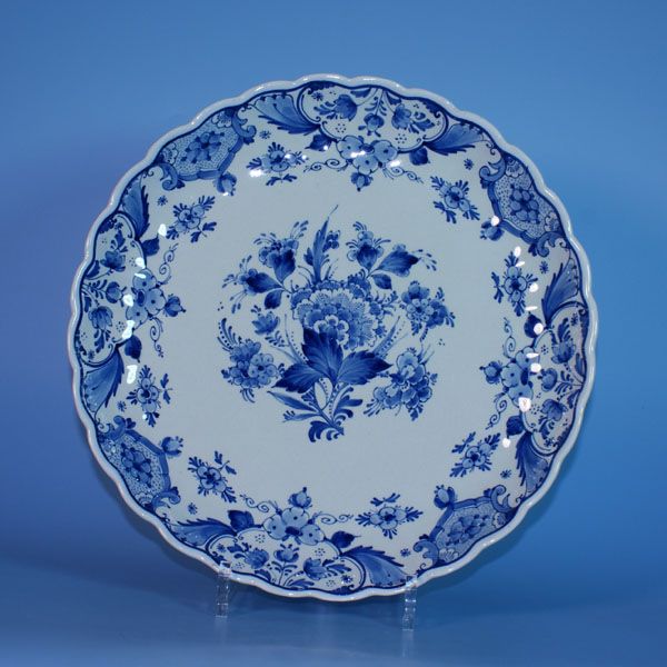 We have a large collection of antique Dutch tiles and Delftware in our