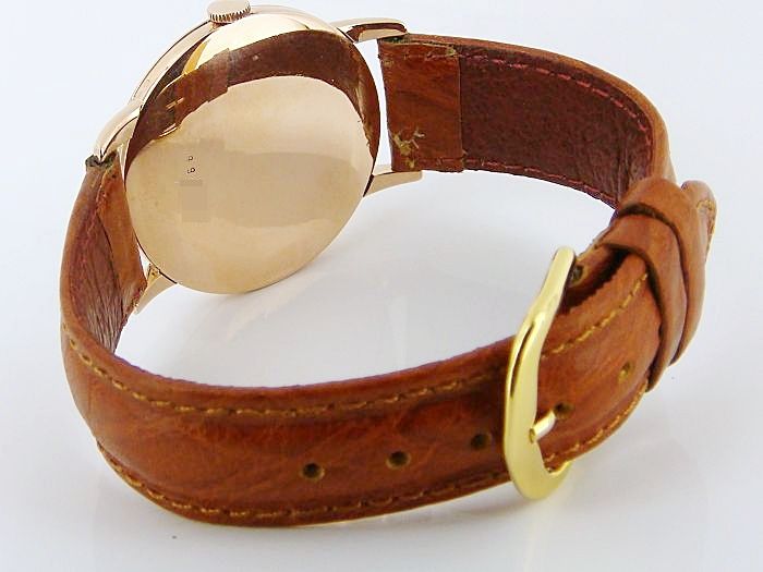 Antimagnetique Herrenarmbanduhr Handaufzug in 585/  Gelbgold